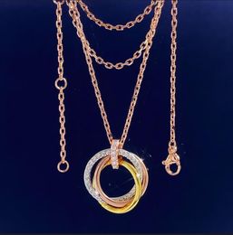 Mode nouveau design triple anneaux trois couleurs pendentif collier plein diamants boucle d'oreille bijoux de créateur T0222