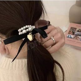 Banda para el cabello con perlas a la moda, coleteros con lazo coreano para niñas y mujeres, tocados, pulsera de temperamento Simple, accesorios para el cabello