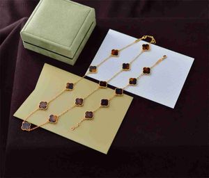 Colliers pendentif de mode colliers créateurs bijoux trèfle à quatre feuilles ensembles de colliers et bracelets 5 motifs bijoux de luxe en acier inoxydable mariage 240302