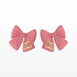 Fashion Pink Bow Earrings Charm 2023 Nieuwe stijl Women Stud Earrings Designer Geschenk sieraden Fashion Exquisite Love 18K Gold Earrings Party Sieraden Groothandel