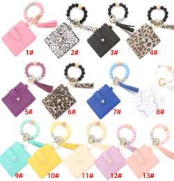 Bracelet en cuir PU Fashion Bracelet Keetchain Party Favoule Pichets Bangle Key Ring Holder Carte Sac en silicone Per perle Keychains3615485