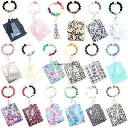 Mode PU cuir Bracelet portefeuille porte-clés fête Bracelet porte-clés porte-carte sac Silicone perlé bracelet sac à main femmes poignet voiture anneaux avec gland