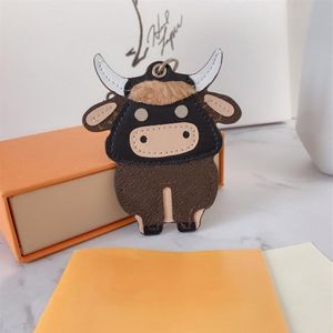 Mode PU Cuir OX Bétail Vache Porte-clés Designer Porte-clés Porte-clés De Voiture Titulaire Taureau Pendentif Noël N e w Année Cadeau avec Box233s