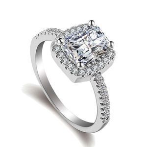 Mode ringen verzilverde witte zirkoon ingelegde kristallen ring elegante bruiloftsplein strass ringen voor vrouwen wil en zanddruppelschip