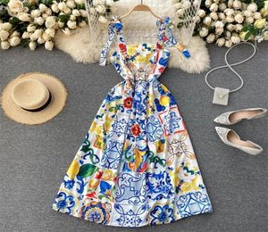 Vestido de verano de moda New Women039s Bow Spaghetti Strap sin espalda Azul y White White Floral Temper Long Vestido 2103155374004