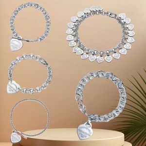 Fashion Senior Designer 925 Sterling Silver Charm Bracelet T Series Bracelet Boucles d'oreilles pour femmes Love Lock avec Bracelet Classic Bijoux classique à 18 carats Cadeau