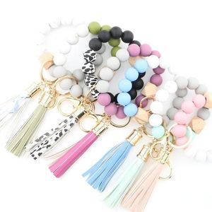 Bracelets de perles en Silicone à la mode, pompon en hêtre, porte-clés, pendentif, Bracelet en cuir, bijoux pour femmes, 14 styles 496