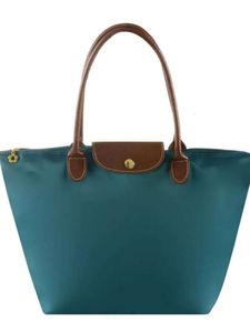 Fashion simple et polyvalente sac à épaule de grande capacité maman sac de voyage de loisirs pour femmes sac à main
