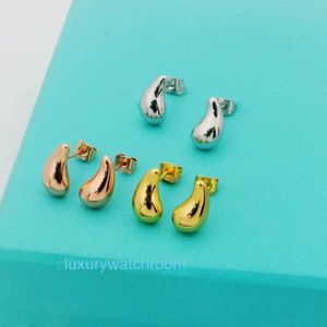 Fashion Simple Ttifeeny Moucles d'oreilles polyvalentes Bull Horn Golden Droplet Feme Crowd Design haut de gamme Cold Cold Temperament Temperament Ear Bijoux