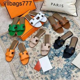Fashion Slipper Oran Sandals Original Véritine en cuir Vomes Summer Luxury Flat Ladies Beach Sandal Party Party