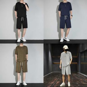 Mode Costume De Sport Hommes Survêtements D'été D'affaires À Manches Courtes Casual Glace Soie À Séchage Rapide Mince Couleur Unie Noir T-shirt Deux Pièces Shorts Ensemble Hommes M-4XL