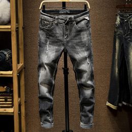 Heren jeans mode streetwear mannen zwart grijs kleur vernietigde gescheurde slanke pasvormige broek Italiaanse vintage homme