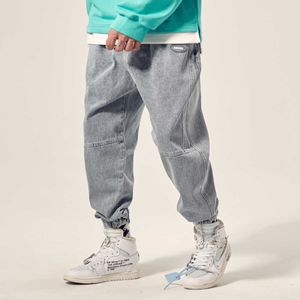 Mode Streetweat hommes jean coupe ample épissé Designer coton Denim Cargo pantalon haute qualité Hip Hop Joggers pantalon à jambes larges