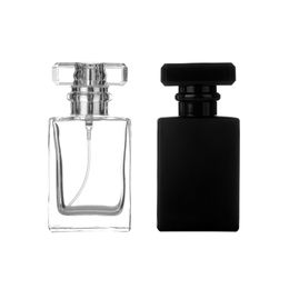 Mode-stijl 30 ml draagbare transparante zwarte glas parfum spuitflessen met aluminium verstuiver LX2258