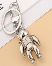 Mode Élégant Designer De Luxe Porte-clés Marques Classiques Boucle Clé Astronaute Pendentif Argent Mat Porte-clés Pour Hommes Femmes Sac Pe6777469