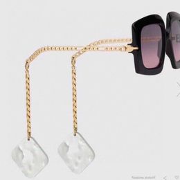 0722S lunettes de soleil pour femme mode métal plein cadre pendentif magique exquis GlassesUV400 lunettes de soleil de créateur dans la boîte d'origine 0722