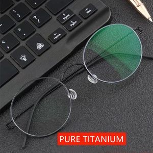 Marca de gafas de sol de gafas de sol de moda marco de gafas de titanio redonda de titanio