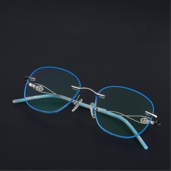 Lunettes de soleil de mode Cadres Rétro Sans cadre Femmes Diamant Coupe Bordure Blu-ray Invisible Vis Verres Femmes Designer Lunettes Lunettes