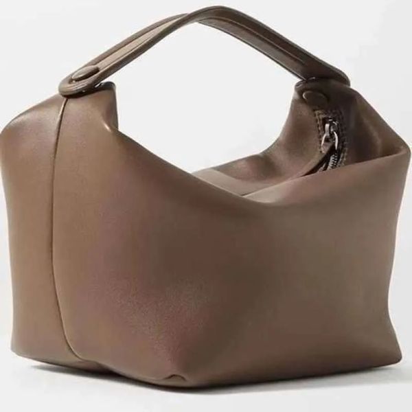 Bolso de mano a la moda, bolso negro, bolso de almuerzo de piel de vaca, bolso de diseñador, bolso de mano de cuero con botones minimalistas, bolso de maquillaje para viajeros