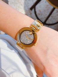 Tendance de la mode montre pour femme 36mm en acier inoxydable incrusté de diamants simple boîtier en or atmosphérique bracelet de montre lumière crue petit cadran étanche 2023 nouveau designer de montre