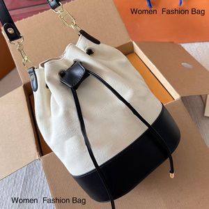 Mode veelzijdige canvas De bucket Bag Designer enkele schouder crossbody handtas voor vrouwen met eenvoudige lederen accenten perfect voor dagelijkse uitstapjes en modezakken