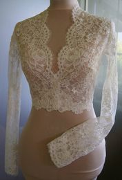 Moda Blanco Marfil Encargo nupcial Envolturas de boda Chaqueta Diseñador barato Encaje Mangas largas Cuello en V Estilo Boda romántica Bolero 218j