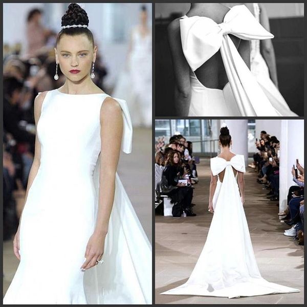 Mode blanc design spécial dos grand arc robe de soirée sirène tache sans manches robes de bal longue tapis rouge Dress233m
