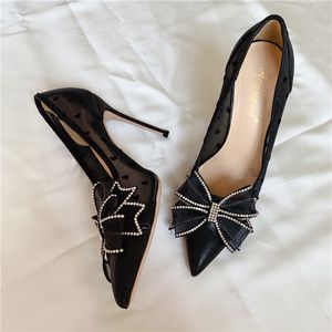 Gratis mode vrouwen zwarte satijnen lederen kristallen boog strass pumps voor bruiloft puntige oranje sexy hoge hakken schoenen 12cm stiletto's