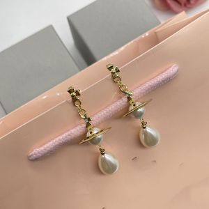 Mode Women Designer Brand Stud -oorbellen Luxe sieraden Planet Earing Metal Pearl Saturn Gold Earring Cjeweler Woman Orecchini