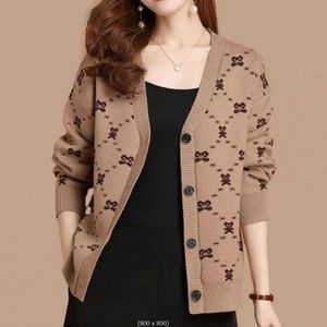 Mode femmes chandails tricotés automne hiver tout-match col en v chaud ample femme bouton Cardigans décontracté pulls manteau 2022
