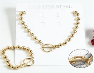 Fashion Femmes Men Silver Color Gold en acier inoxydable Round Lock Key Uno de50 Bread Bracelet Collier Jewelry Christmas Gift4031018