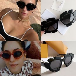 Moda mujer nylon infundido flor gafas de sol Junta universal 100% UVA / UVB protección dama casual gafas de sol personalizadas 40088