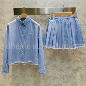 Blusa de manga larga a rayas azules para mujer, conjunto de falda corta con borde de encaje blanco, vestidos decorativos de retazos