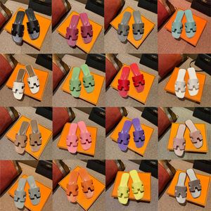 Mode dames slippers ontwerper dia's zomer echte lederen muilezels plat sandalen klassieke strand sandalen schoenen met doos