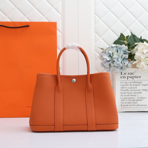 Bolso nuevo de moda y moderno, diseñador famoso, estilo de color sólido clásico, gran marca, mismo estilo, citas para mujeres, compras, turismo, bolsa de compras de cuero regular