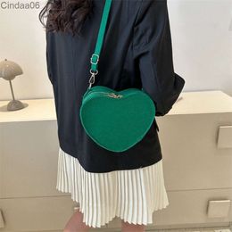 Borsa alla moda per le donne Primavera Nuove semplici borse a tracolla diagonali Designer Messenger Heart Hand Love bag per le donne
