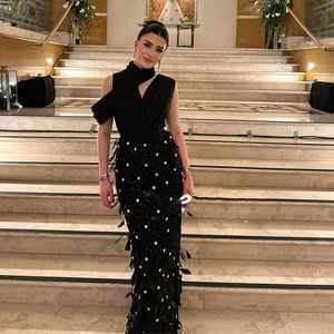 Modieuze zwarte veer prom jurken kralen rare pailletten schede speciale gelegenheid jurk vloer lengte Arabische Dubai vestidos de novia