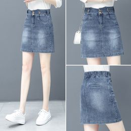 Faldas cortas de mezclilla de moda para mujer, novedad de verano, media falda, edición coreana, cintura elástica, ajustada, primavera, falda a la cadera