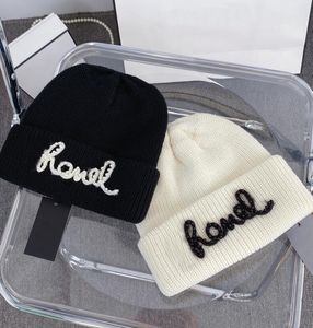 Marque de créateurs à la mode Double lettre ananas rayures broderie bonnet crâne casquettes de luxe unisexe automne hiver noir blanc laine tricoté chapeaux garder au chaud chapeau