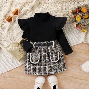 Conjunto de niñas de moda Otoño e Invierno Nuevo estilo de moda Conjunto de niñas cortas de lana a cuadros con cuello alto y cuello alto para niños de escuela pequeña y mediana Conjunto de dos piezas