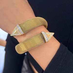 Bracelet d'ouverture haut de gamme à la mode exagéré européen et américain plaqué or 18 carats en acier inoxydable bracelet en maille polyvalent transfrontalier en gros