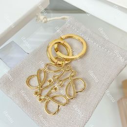 Modieus nieuw product Luxe ontwerp Heren Klassieke high-end sleutelhanger Uitgeholde gepersonaliseerde tashanger voor dames