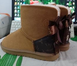 Botas de nieve para mujer Novel L bow U de moda que mantienen la bota abrigada Botas de felpa de piel de oveja con tarjeta de bolsa para el polvo de alta calidad Hermoso regalo Transbordo gratuito