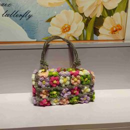 Borsa da banchetto alla moda dolce Internet Celebrity borsa da fiori in acrilico trasparente borsa da banchetto borsa con strass intrecciata a mano borsa da donna sotto le ascelle240115