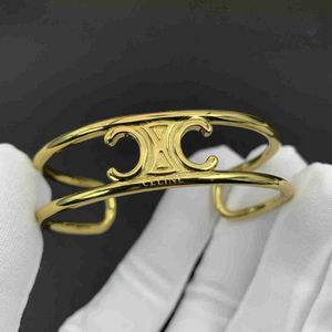 Modieuze triomfchal boog dubbele laag open armband voor dames licht goud uniek ontwerpgevoel Instagram 2024
