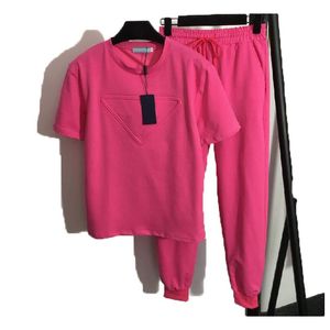 T-shirt à la mode pour femmes Pantalons Survêtements Deux vêtements de sport Nouveaux vêtements de sport Triangle Manches courtes Printemps Manches courtes Manches élastiques Taille Casual Sportswear