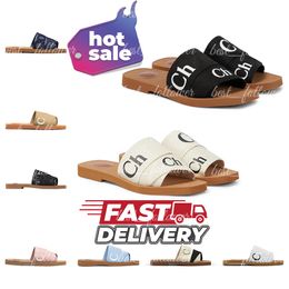 Entrega rápida diseñador mujeres Woody Slides diseñador lienzo zapatillas de goma blanco negro suave rosa vela mulas para mujer sandalias planas moda zapatos de playa al aire libre