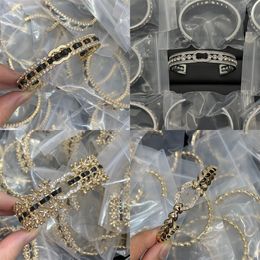 Faux lederen ontwerper armband brief bangle mannen dames kristallen merk armband sieraden 18k gouden titanium stalen polsband manchet liefhebbers geschenken