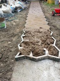 Favorecer el molde de pavimento de piedra de bricolaje para hacer caminos para los moldes de jardín de concreto de su jardín