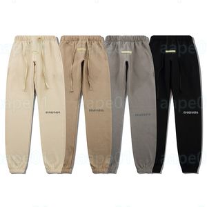 Pantalons de créateurs de hommes de mode Femmes Pantalons de pantalon de couleur unie solide Pantalon de mouvement hip hop pour mâles Joggers décontractés SIME S-XL